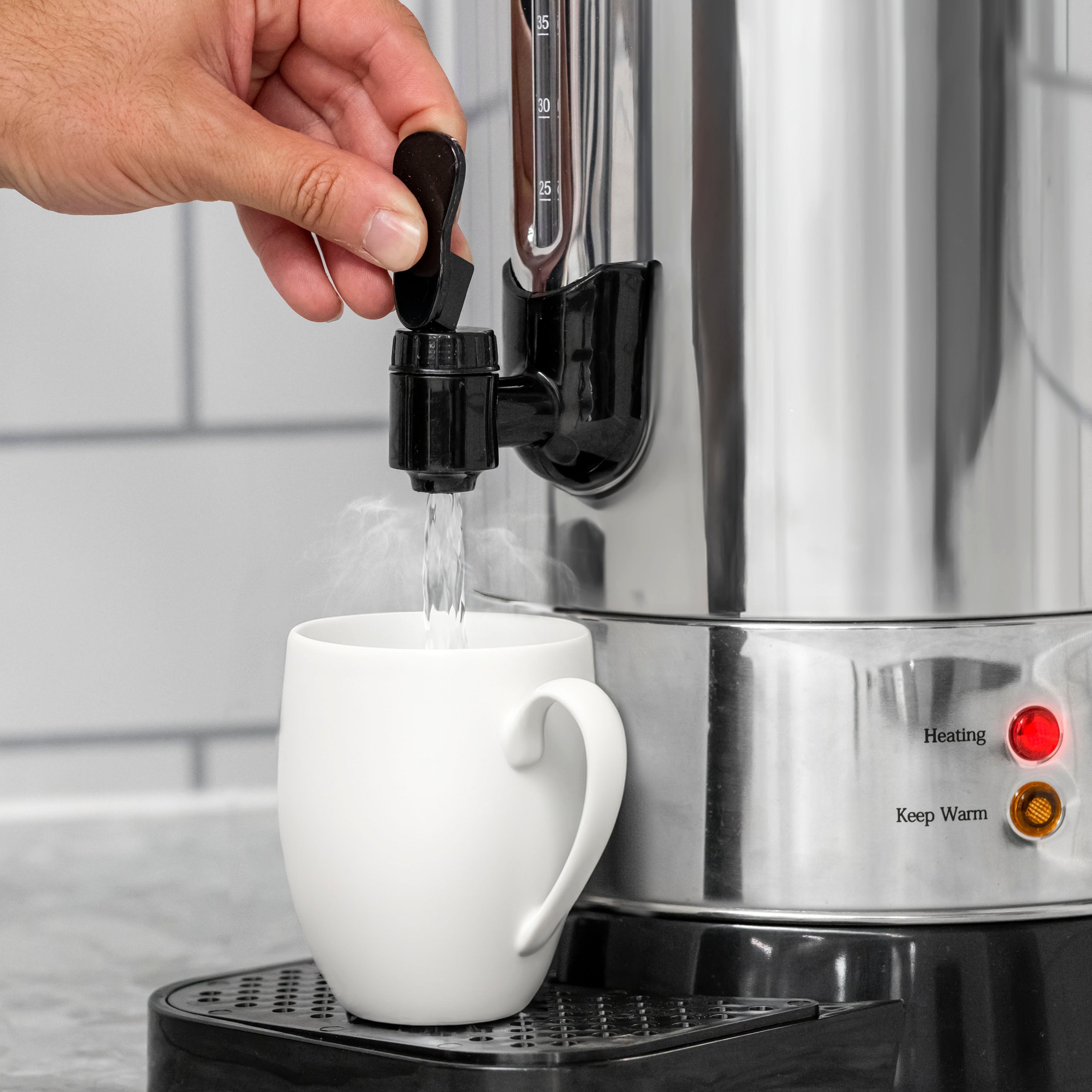 Baridi DH270 Hot Water Dispenser Action shot - in use - close