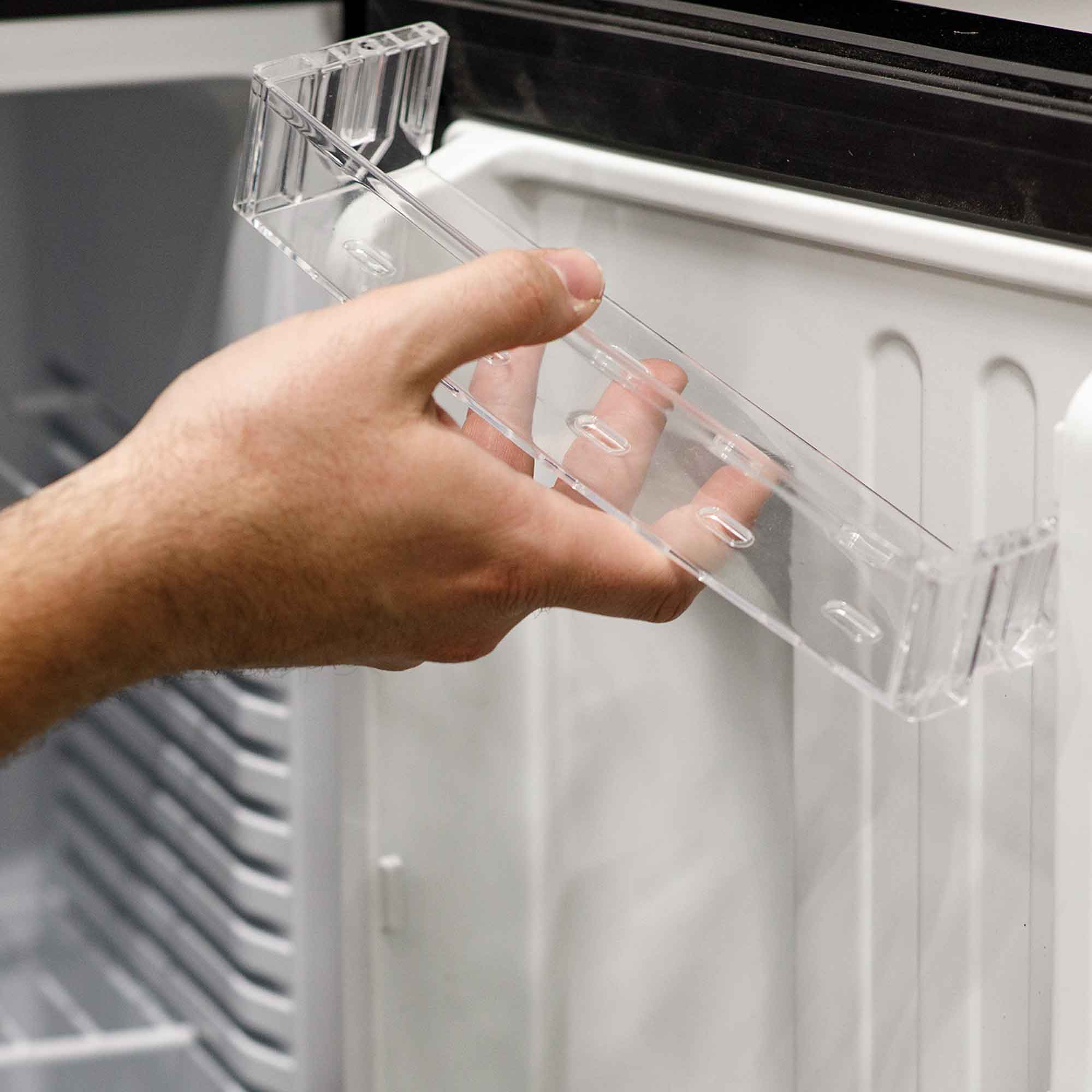 Baridi DH58 Drinks Fridge Action shot - adjusting - shelf - 2nd perspective