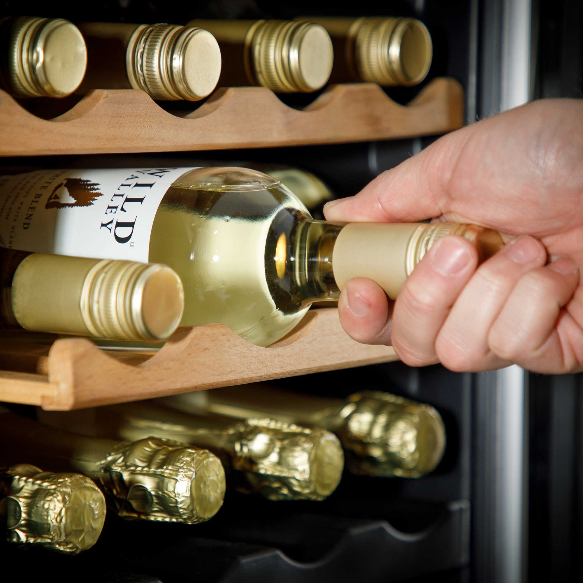 Baridi DH93 Wine Fridges Action shot - pulling - bottle - out